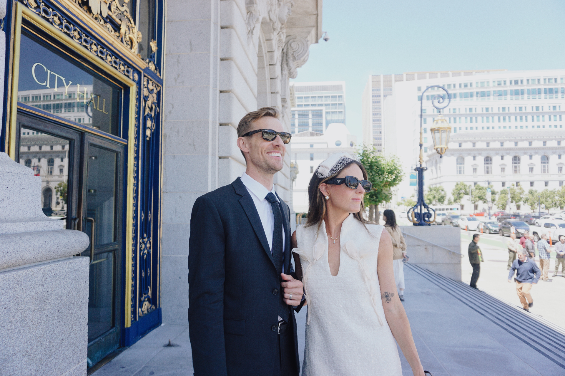 Maggie and Jono outside San Francisco City Hall during their city hall photoshoot